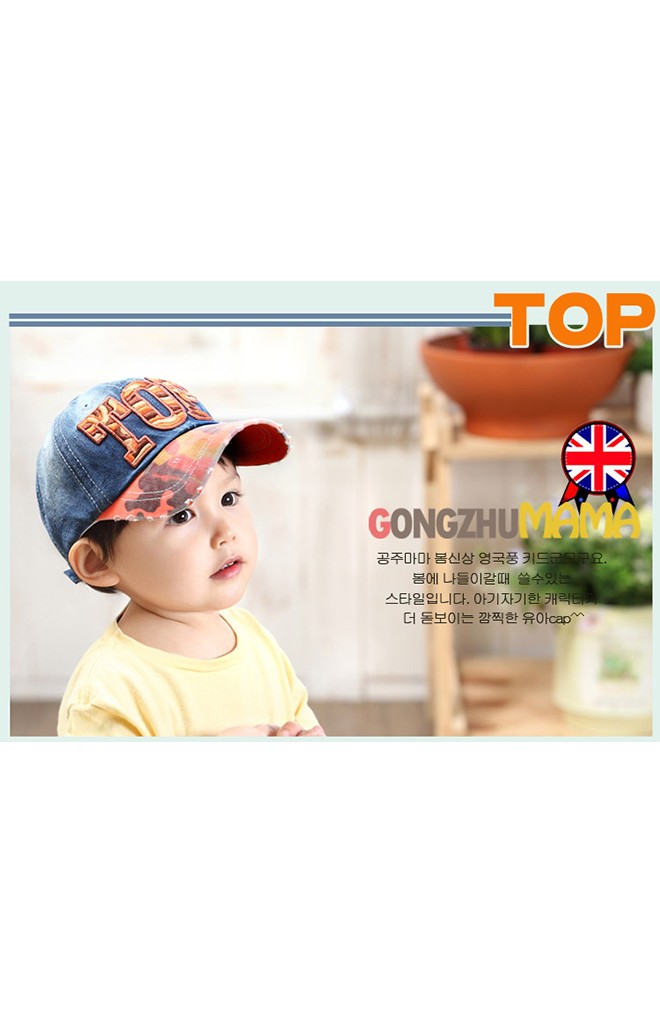 หมวกแก๊ปยีนส์ฟอก ปีกหมวกลายทหาร แต่งอักษร TOP จาก GZMM