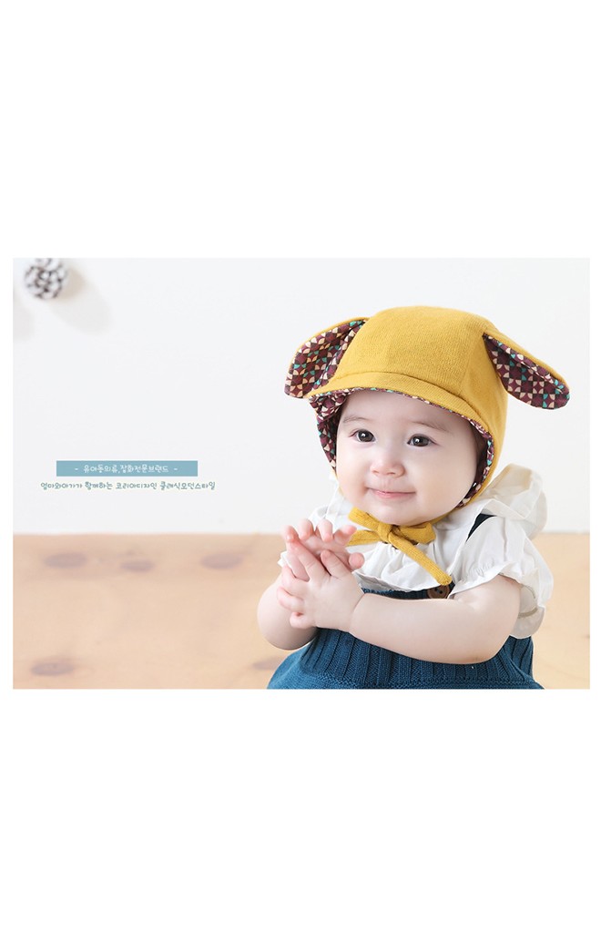 หมวกเด็กแต่งหู มีปีกหมวกเล็กๆ ด้านในผ้าลาย