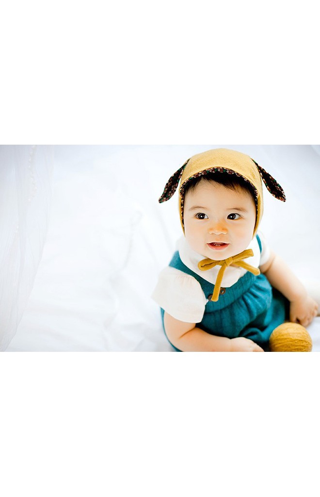 หมวกเด็กแต่งหู มีปีกหมวกเล็กๆ ด้านในผ้าลาย