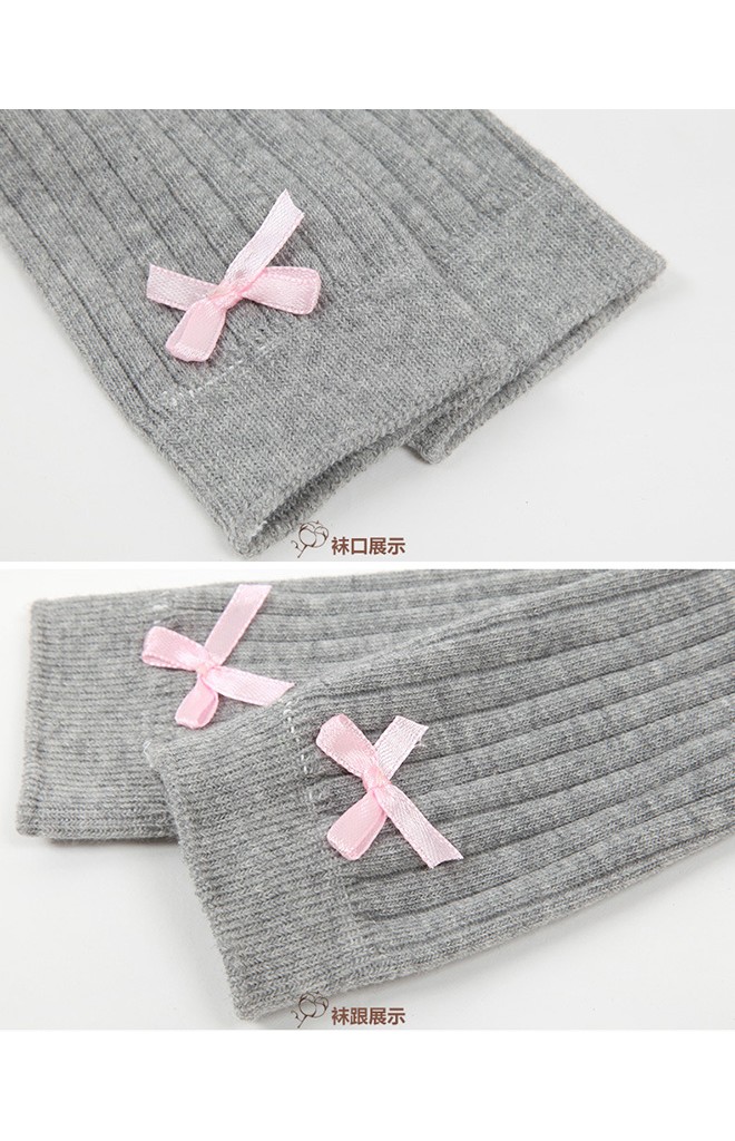 ถุงเท้าเด็กหญิงแบบยาวสีพื้นเรียบๆ แต่งโบว์เล็กๆ