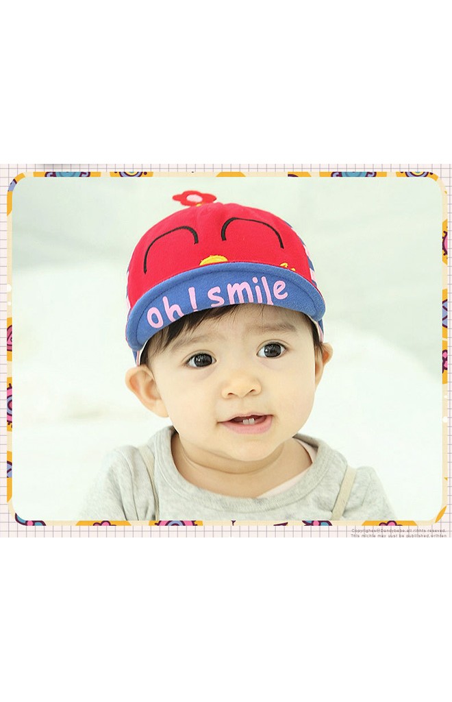 หมวกแก๊ปรูปการ์ตูนหน้ายิ้ม ด้านบนแต่งรูปดอกไม้