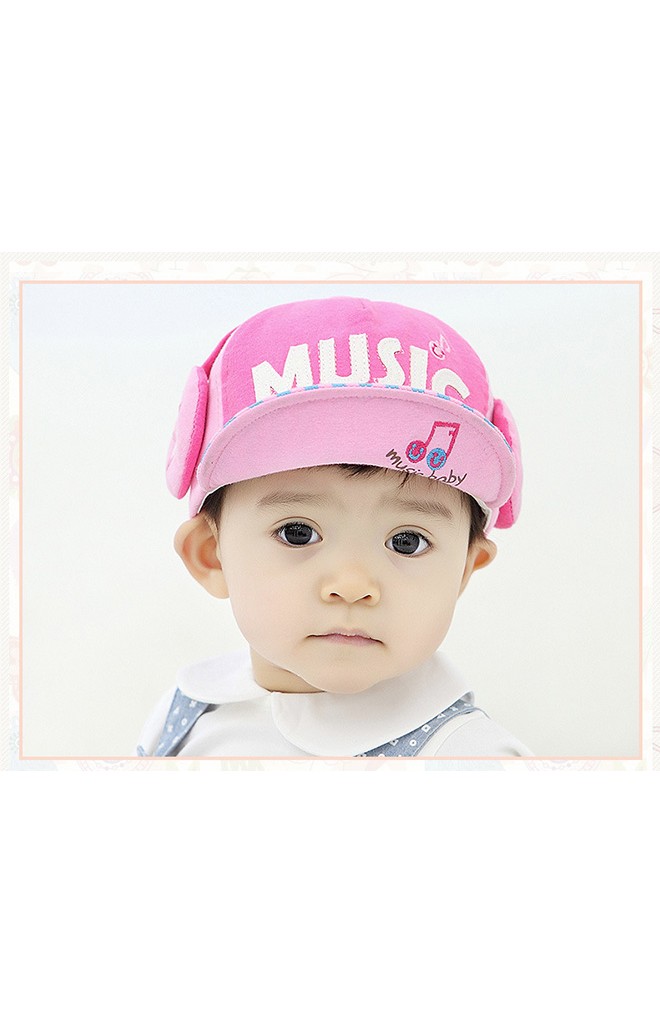 หมวกแก๊ป MUSIC ด้านบนคาดหูฟัง