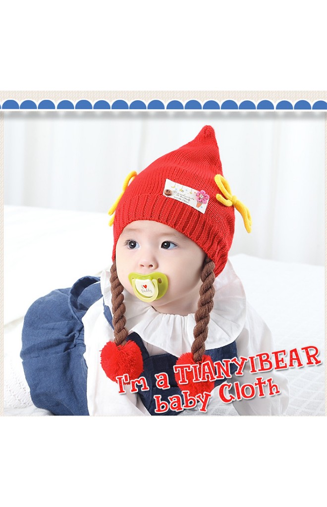หมวกไหมพรมเด็กหญิงยอดแหลมแต่งโบว์ พร้อมสายเปียห้อยปอมปอม