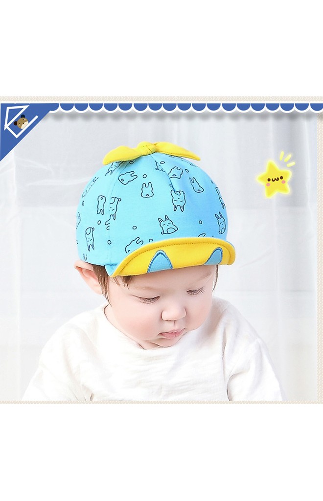 หมวกแก๊ปลายกระต่ายด้านบนแต่งโบว์ผูก จาก TIANYI BEAR