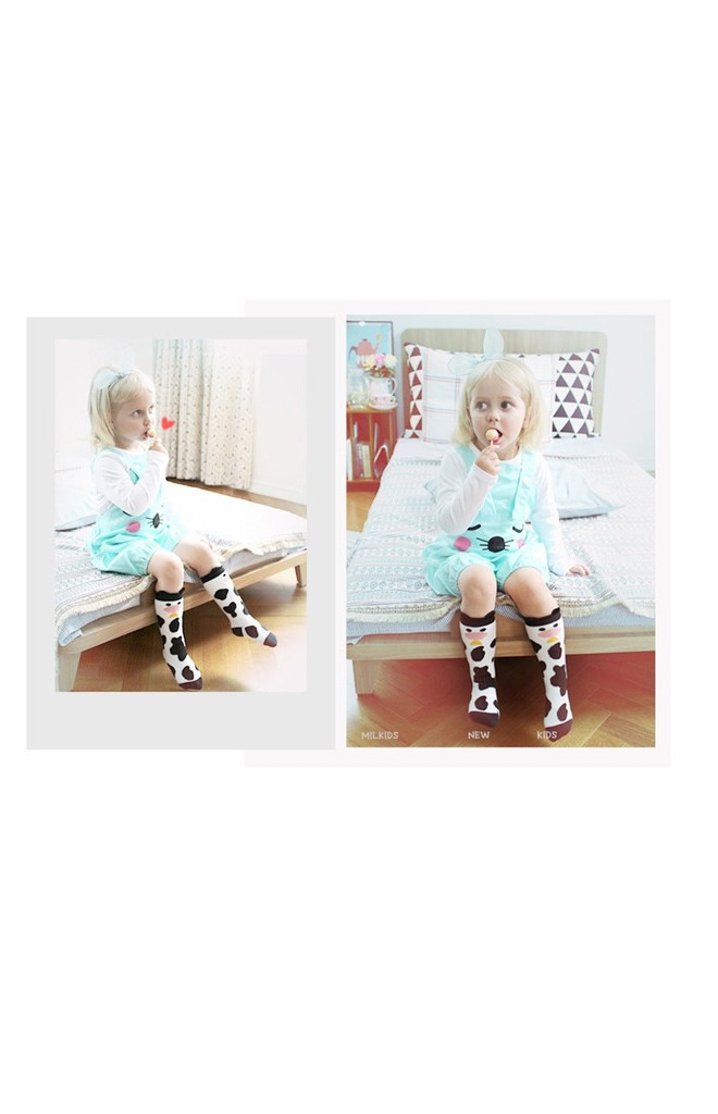 ถุงเท้าเด็กลายวัวน้อย มีกันลื่น จาก Kids Socks