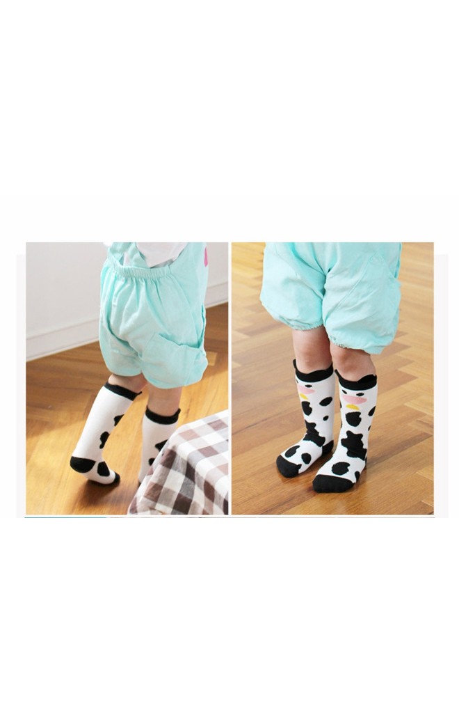 ถุงเท้าเด็กลายวัวน้อย มีกันลื่น จาก Kids Socks