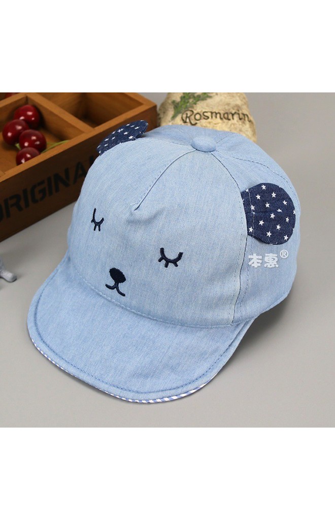 หมวกแก๊ปหน้าหมีหลับแต่งหูลายจุด จาก KUKUJI