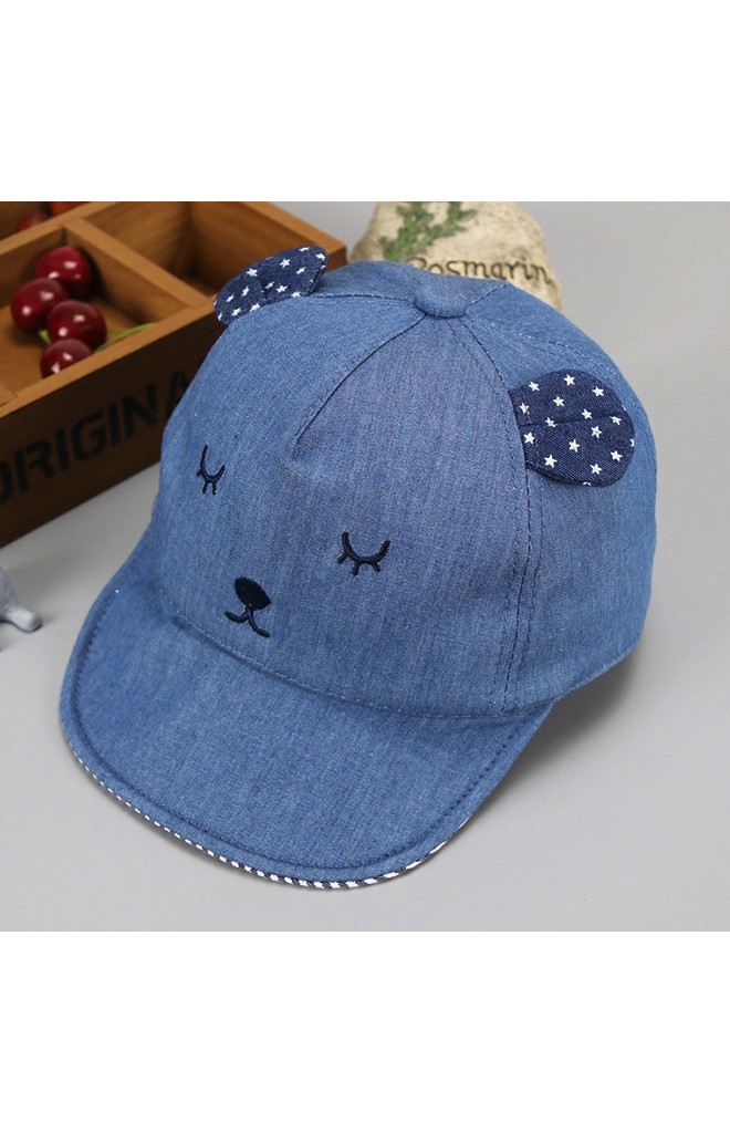 หมวกแก๊ปหน้าหมีหลับแต่งหูลายจุด จาก KUKUJI