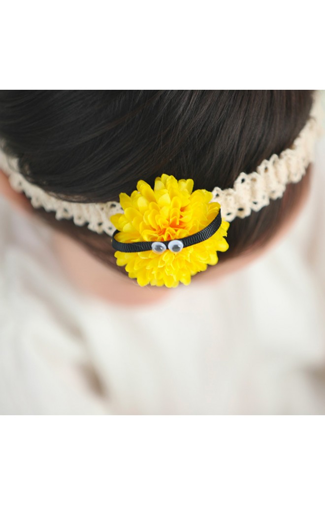 สายคาดผมดอกไม้สีเหลืองแต่งตาเล็กๆ จาก Angel Neitiri