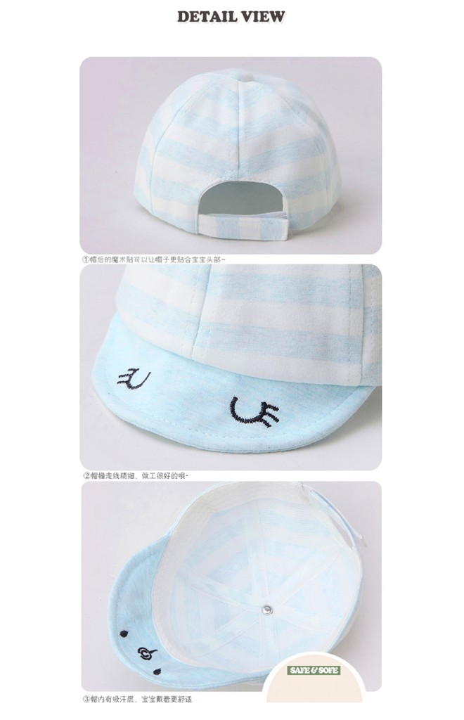 หมวกแก๊ปลายขวาง ปีกหมวกด้านบนปักตายิ้มหวาน ด้านล่างปักหน้ากระต่าย