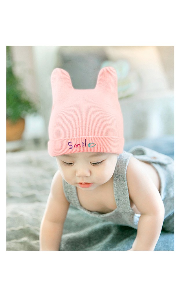 หมวกไหมพรมหูตั้งพับขอบปัก Smile จาก GZMM