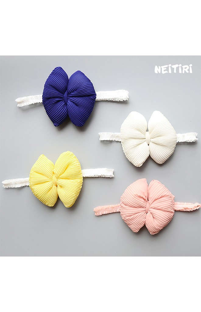 สายคาดผมโบว์นูนผ้าพลีท จาก Angel Neitiri
