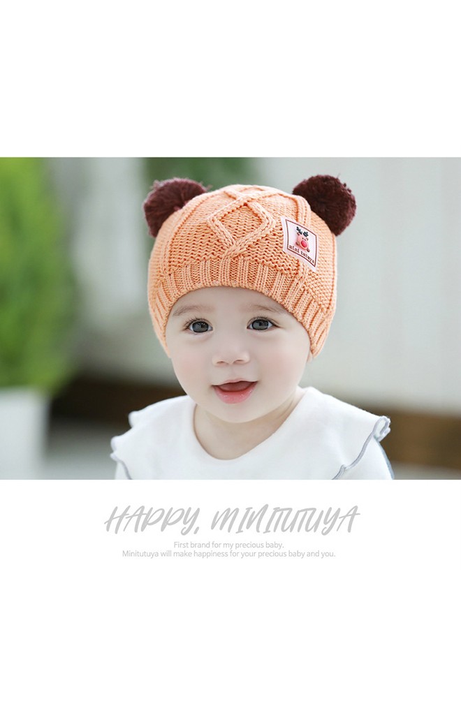หมวกไหมพรมสีส้มแต่งหูปอมด้านบน ด้านหน้าแต่งรูปกวาง TUTUYA