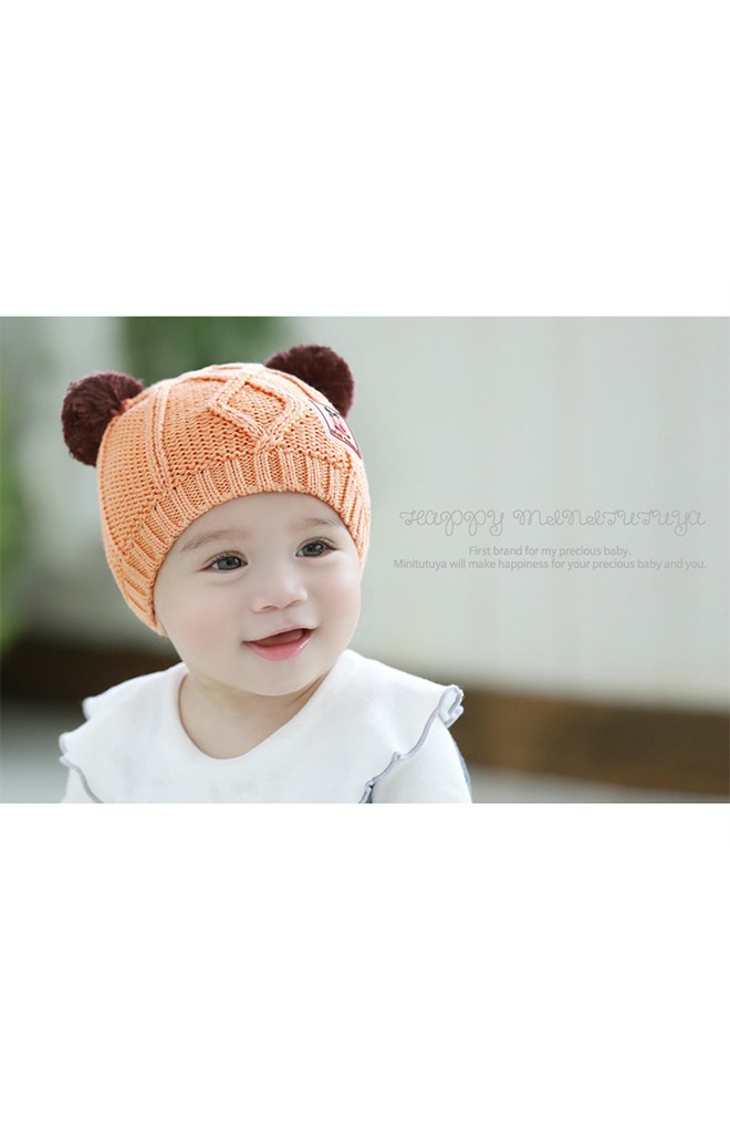 หมวกไหมพรมสีส้มแต่งหูปอมด้านบน ด้านหน้าแต่งรูปกวาง TUTUYA
