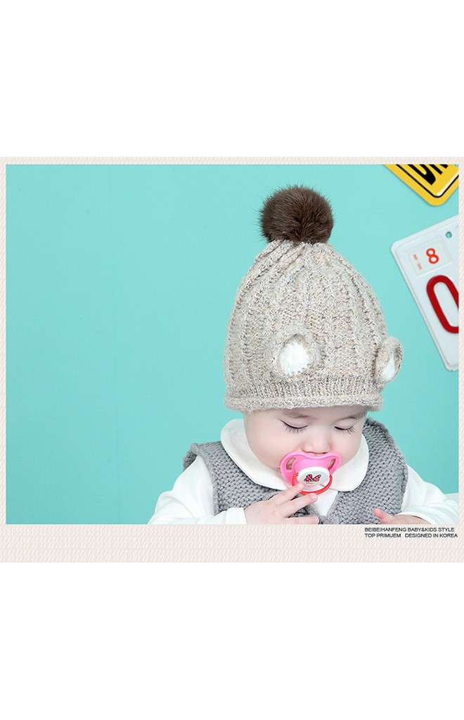 หมวกไหมพรมสีเหลือบหน้าแต่งหูกลมๆ น่ารัก