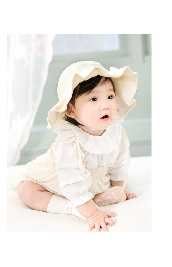 หมวกสาวน้อยลายดอกซี่ แต่งโบว์น่ารัก