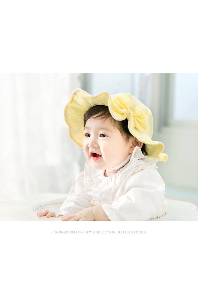 หมวกสาวน้อยลายดอกซี่ แต่งโบว์น่ารัก
