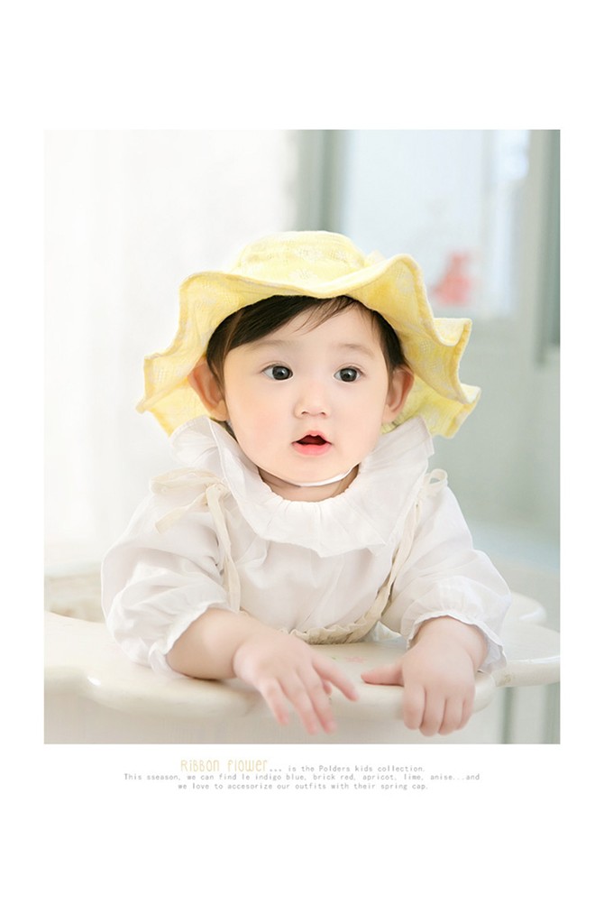หมวกสาวน้อยลายดอกซี่ แต่งโบว์น่ารัก