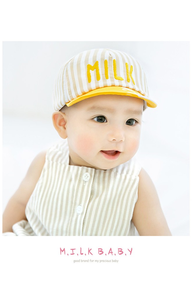 หมวกแก๊ปลายทางปักอักษร MILK ใต้ปีกหมวกสกรีนรูปเพนกวิน GZMM
