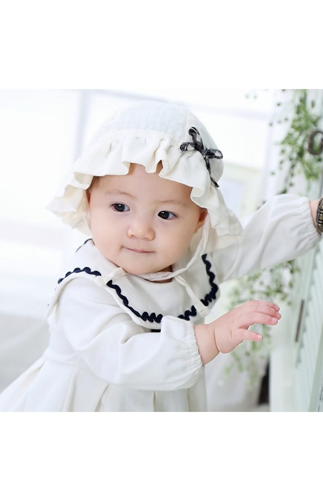 หมวกสาวน้อยผ้าฝ้ายสีครีมแต่งโบว์ลายสก๊อต
