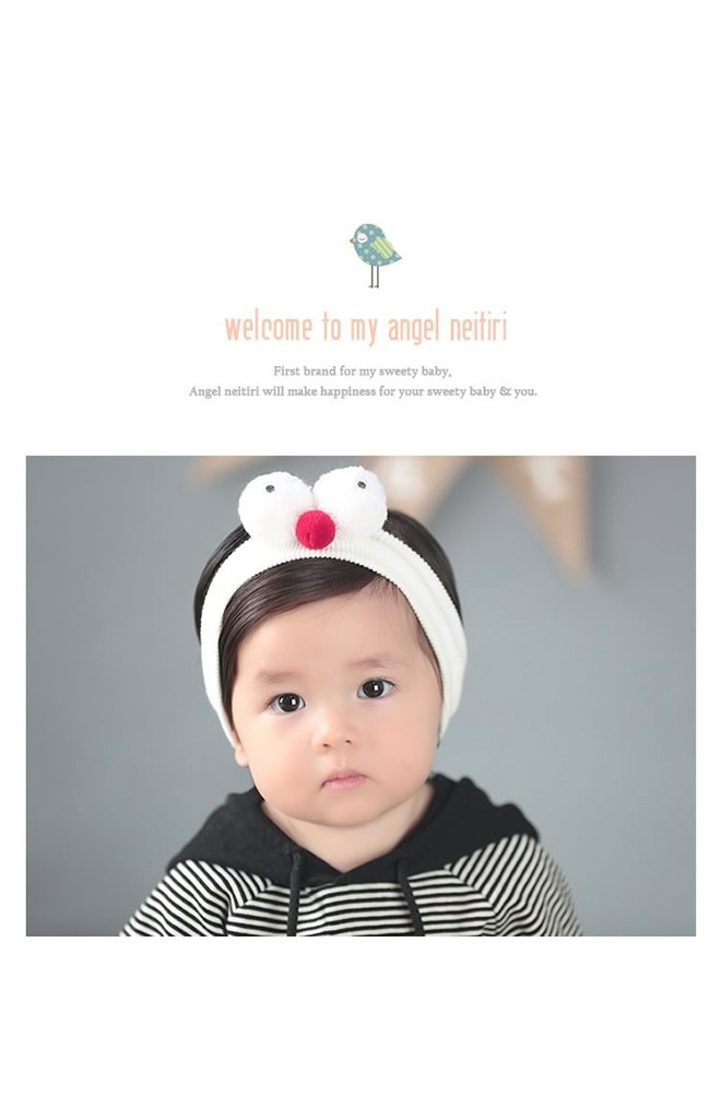 ผ้าคาดผมสีขาวครีมแต่งตุ๊กตาตาโต จาก Angel Neitiri