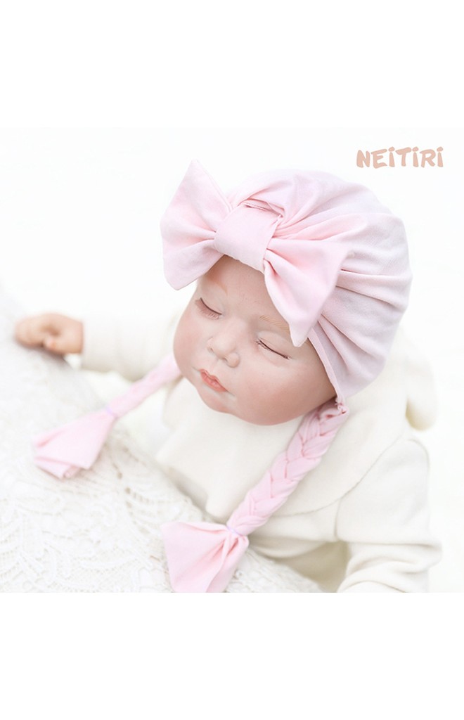 หมวกสาวน้อยแต่งโบว์ห้อยเปียน่ารักๆ จาก Angel Neitiri