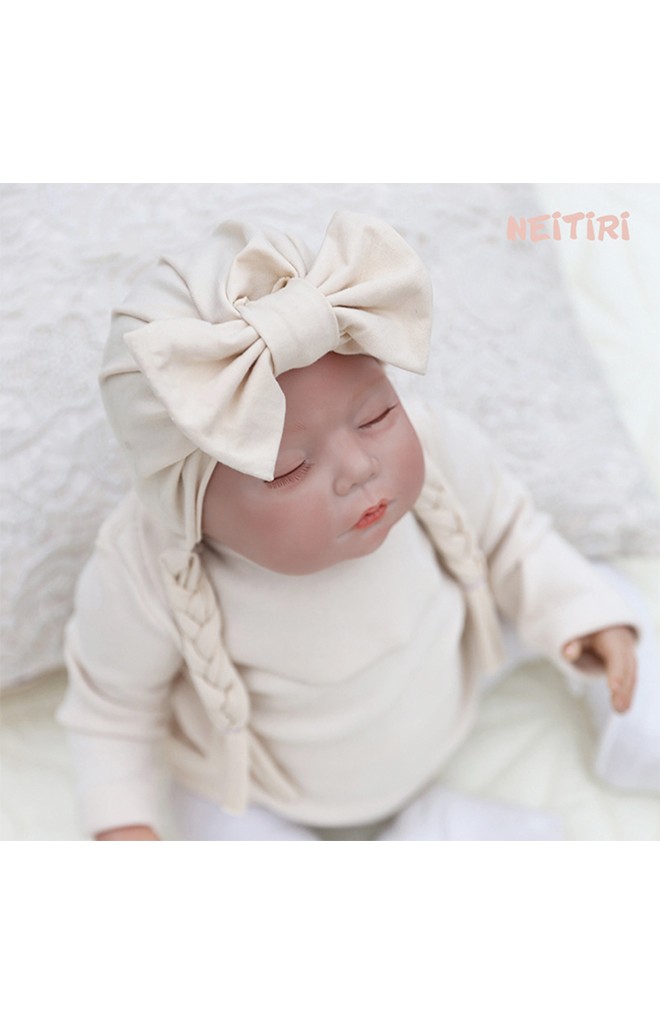 หมวกสาวน้อยแต่งโบว์ห้อยเปียน่ารักๆ จาก Angel Neitiri
