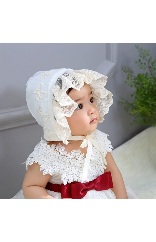 หมวกผูกคางสาวน้อยลายโบว์ด้านหน้าระบายลูกไม้