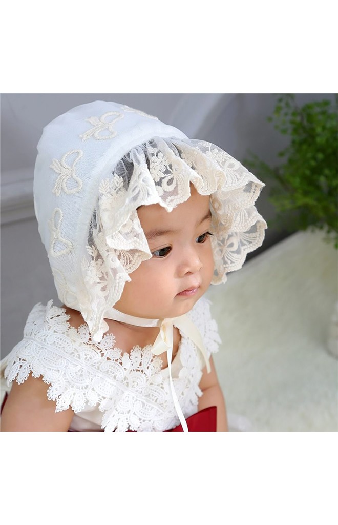 หมวกผูกคางสาวน้อยลายโบว์ด้านหน้าระบายลูกไม้