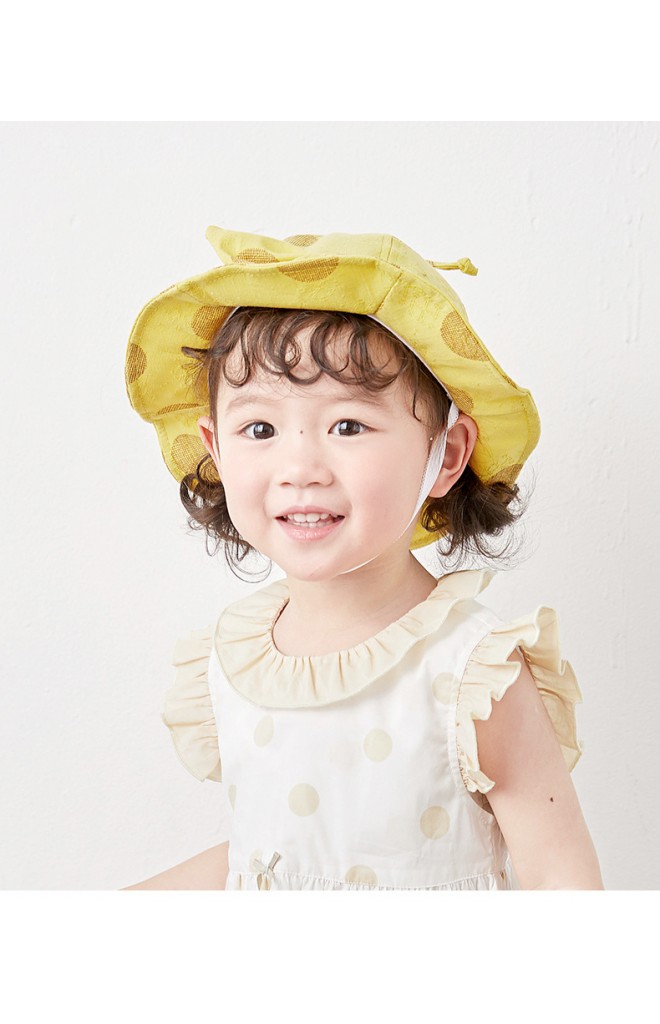 หมวกปีกรอบผ้าฝ้ายลายจุด ด้านหน้าแต่งโบว์ ด้านบนแต่งสายเชือกผูก