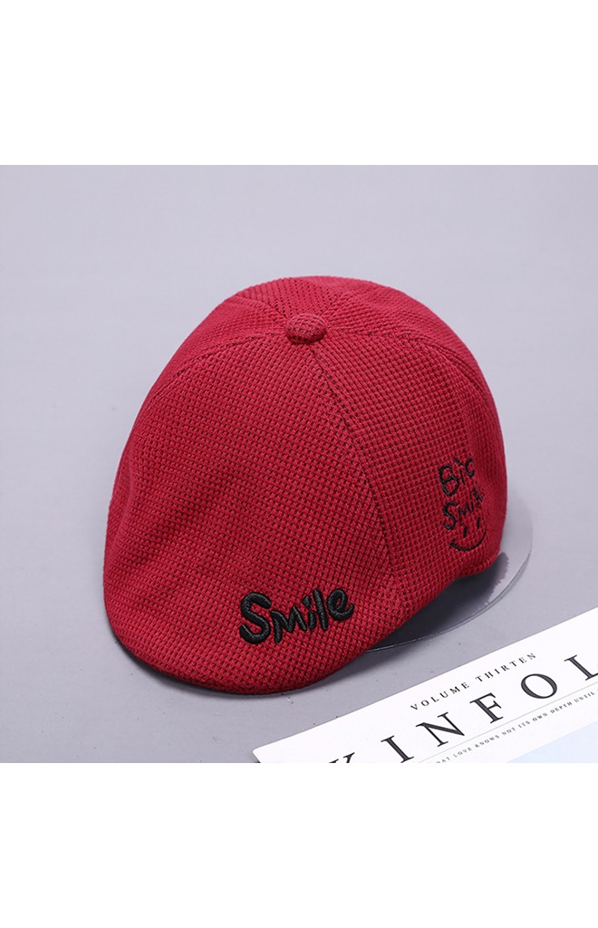 หมวกแฟลตแค๊ป ปัก Smile จาก KUKUJI