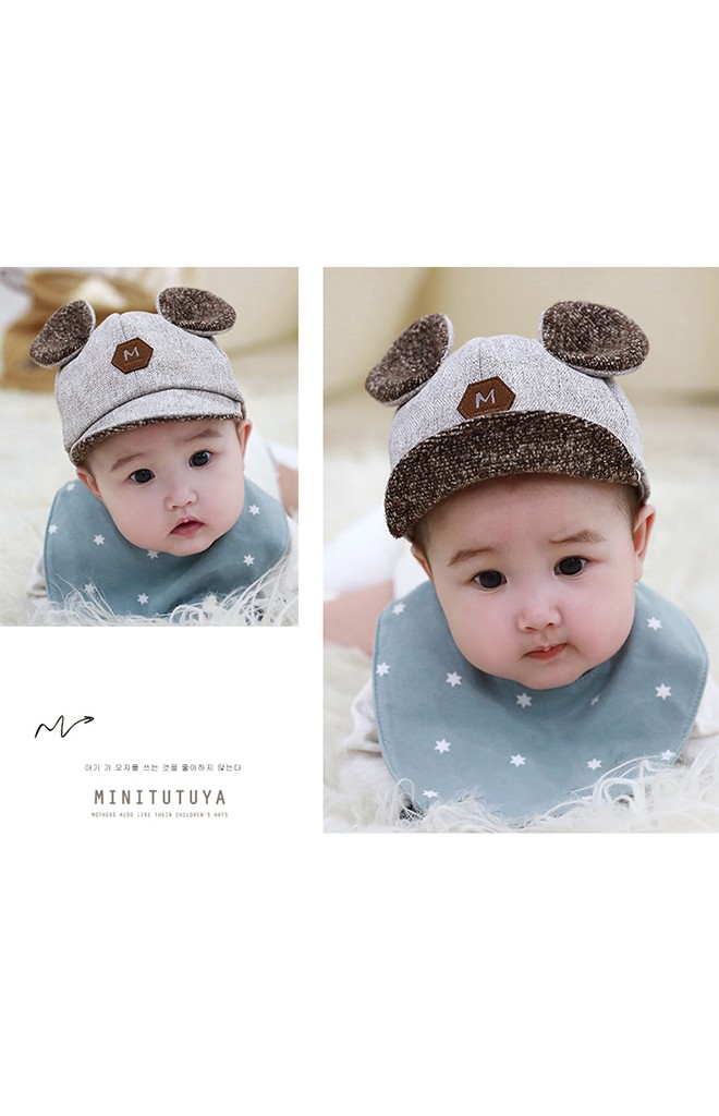 หมวกแก๊ปแต่งหูกลม ป้ายอักษร M จาก TUTUYA