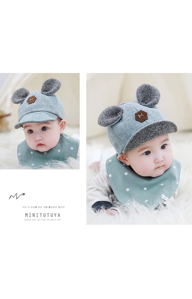หมวกแก๊ปแต่งหูกลม ป้ายอักษร M จาก TUTUYA