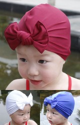 หมวกว่ายน้ำเด็กหญิงแบบสีพื้นผูกโบว์น่ารัก