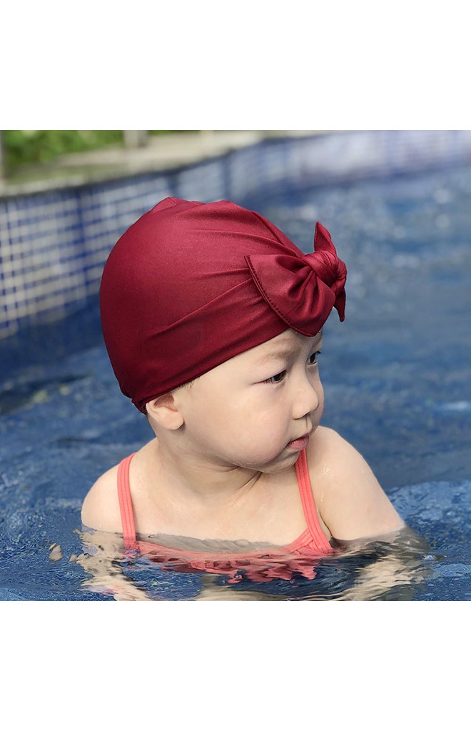 หมวกว่ายน้ำเด็กหญิงแบบสีพื้นผูกโบว์น่ารัก