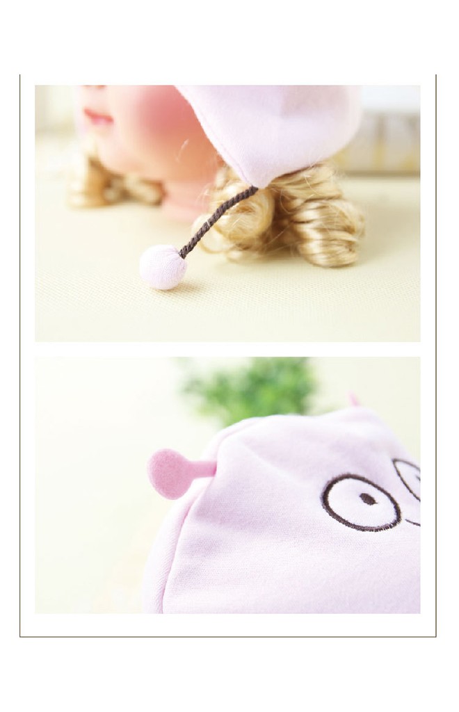 หมวกเด็กปักหน้าการ์ตูนตากลม แต่งหนวดและตุ้มห้อยเล็กๆ