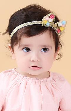 สายคาดโบว์ตาข่ายด้านในเป็นลูกบอลสีสดใส
